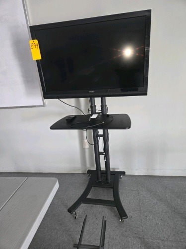 VIZIO TELEVISION ON STAND